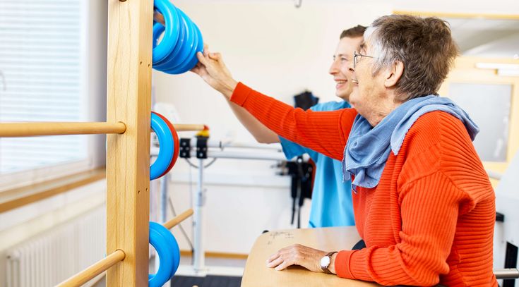 Physiotherapeut Pascal Grässle mit Patientin
